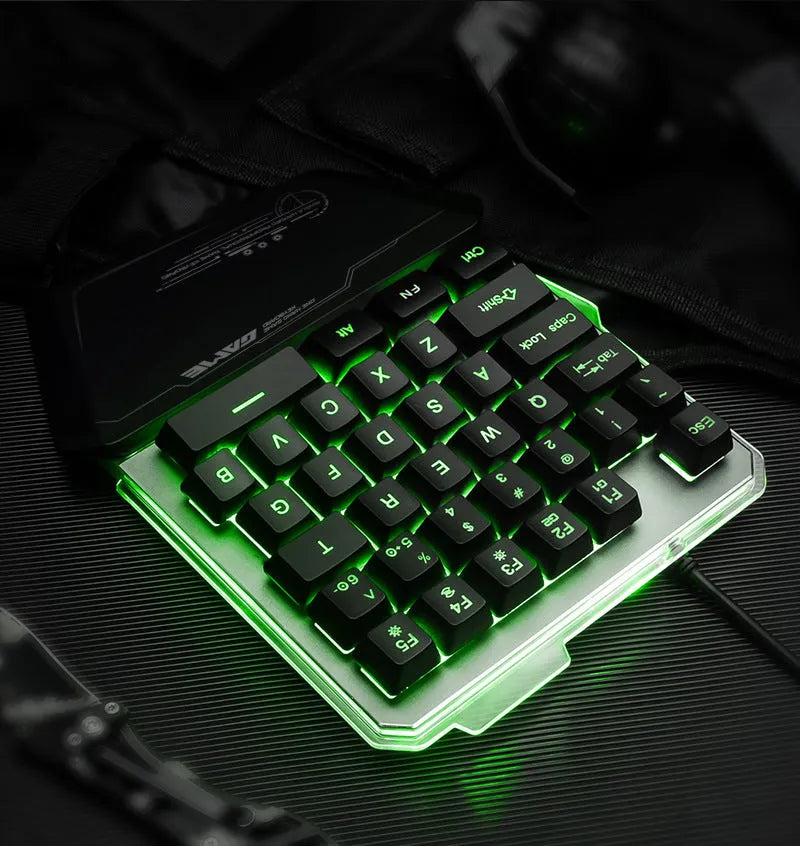Black robotic one-handed mechanical keyboard with RGB backlit keys on a G40 flow colour plate.