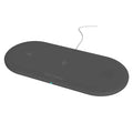Black three-in-one desktop wireless charging station for iPhone, Apple Watch and wireless headphones.