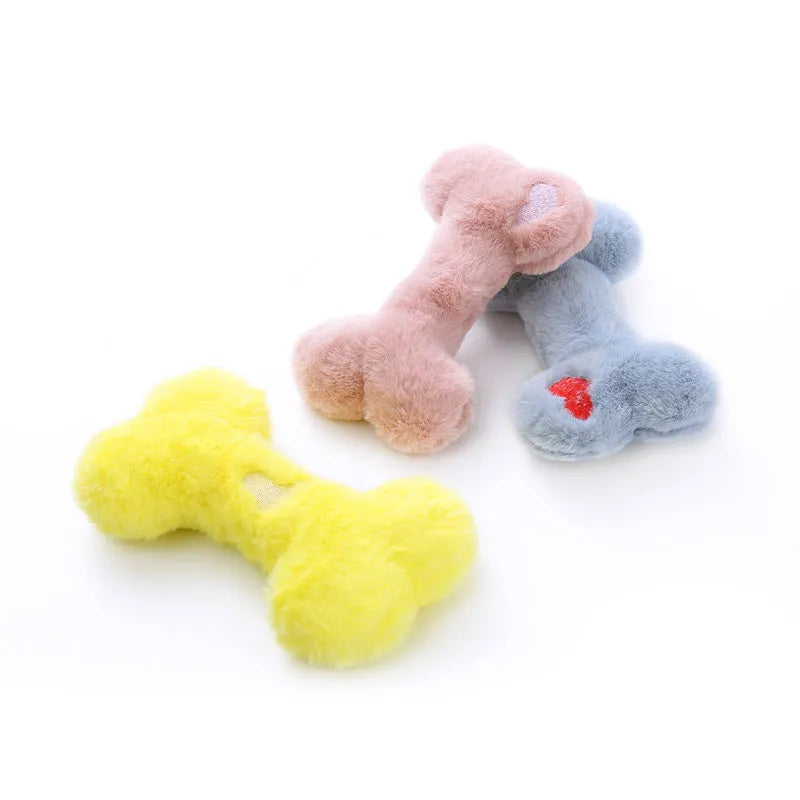 Blue Love Bone shaped plush dog toy with a squeaker on a white background.