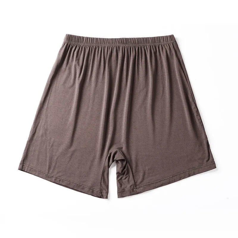 Solid colour high-waist men's modal boxers in black, brown, grey, and blue on a white background