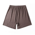 Solid colour high-waist men's modal boxers in black, brown, grey, and blue on a white background