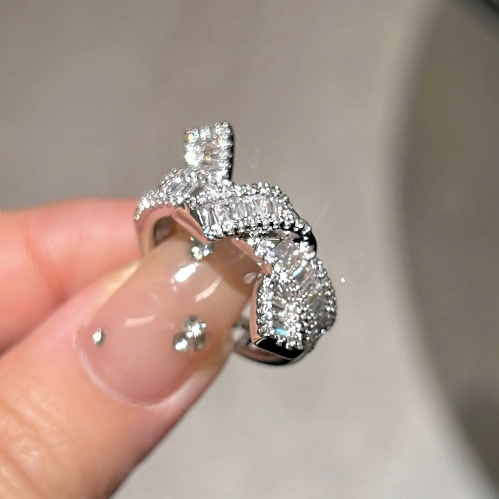 Silver cross open ring with bow shape, copper base with electroplated finish, minimalist light luxury style