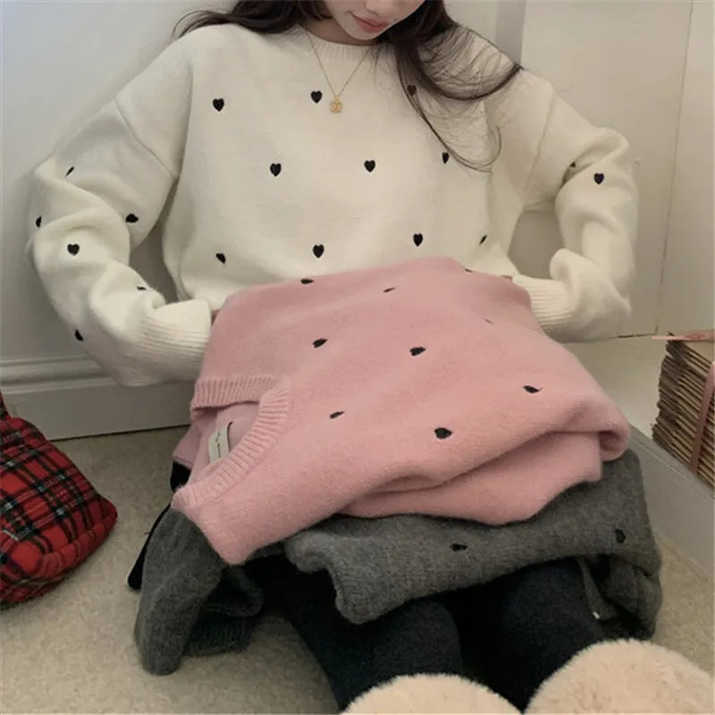 Women's loose fit acrylic pullover sweater with embroidery detail in milky white colour