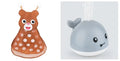 Automatic water-sensing whale bath toy with spray, lights, and music functions for baby bath time
