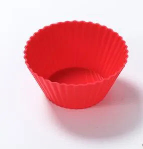 12 nonstick reusable silicone cupcake liners in six colours arranged for baking