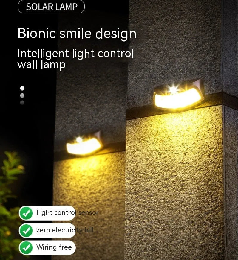 Solar-powered smiling face outdoor wall light for garden decoration