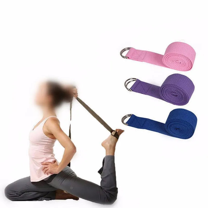 Pure colour EVA yoga brick, thick non-slip mat, and cotton tension band on a floor, in blue, purple, pink, red, black, gray