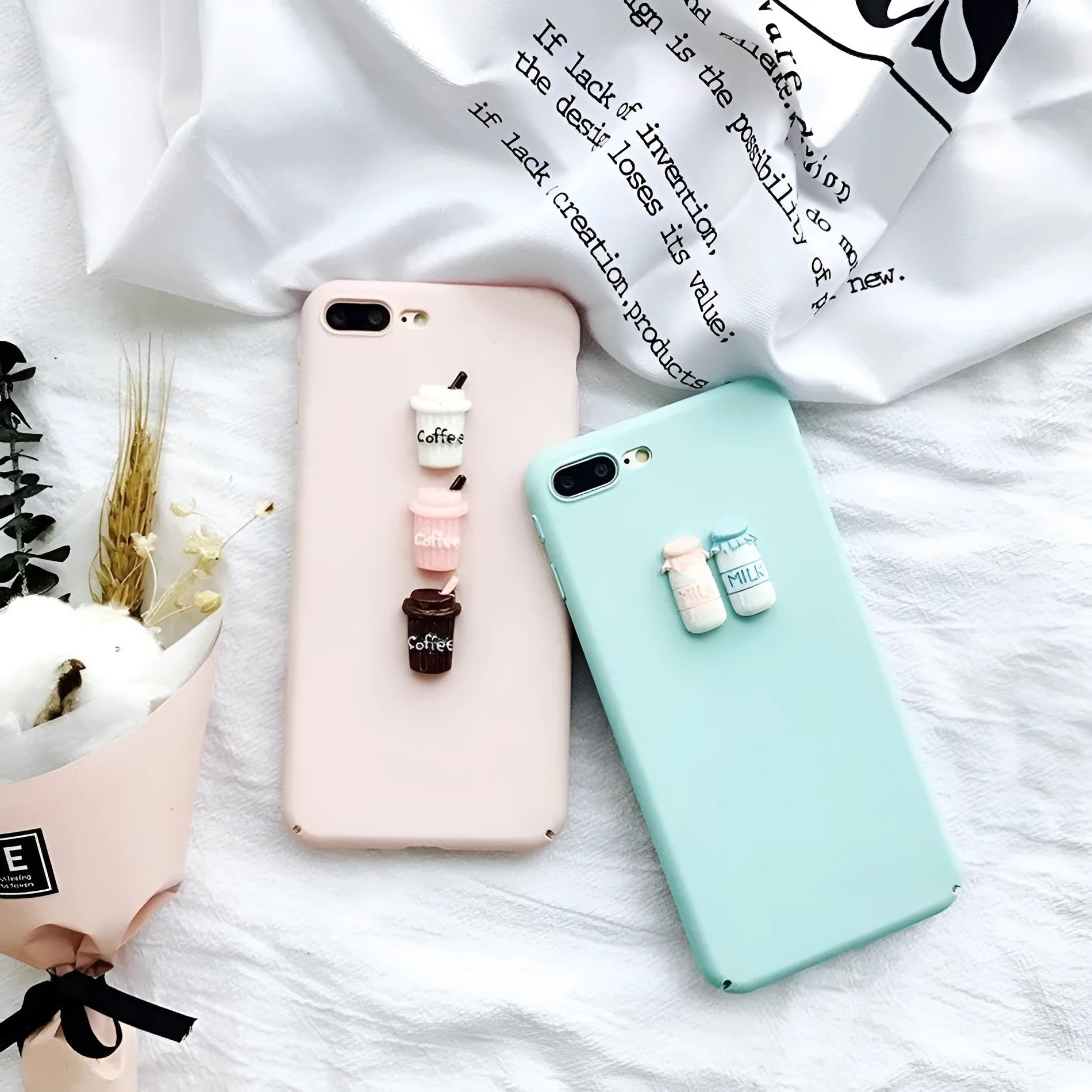 Soft silicone iPhone case with a raised 3D cartoon cat design in pink.