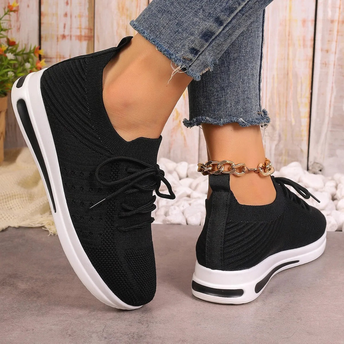 Women's low-top casual sneakers in black, blue, or red with round toe and lace-up front