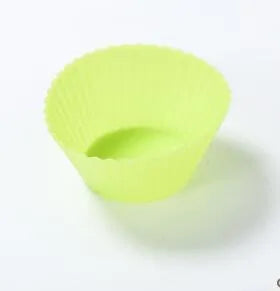 12 nonstick reusable silicone cupcake liners in six colours arranged for baking