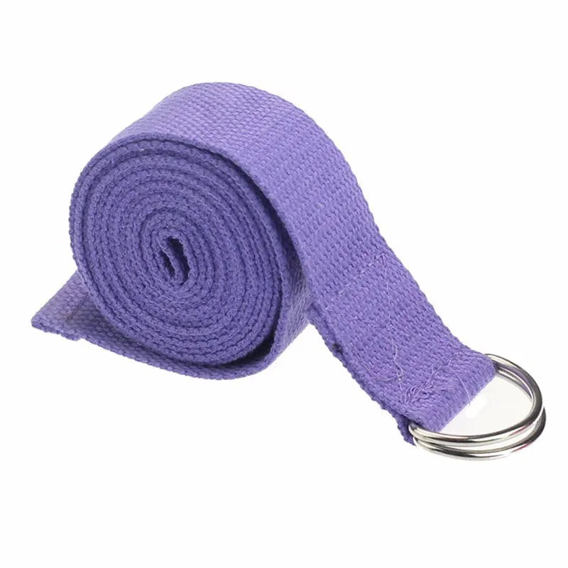 Pure colour EVA yoga brick, thick non-slip mat, and cotton tension band on a floor, in blue, purple, pink, red, black, gray