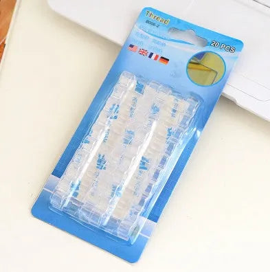 Self-adhesive wire cable organizer clips in black and transparent for desk cable management