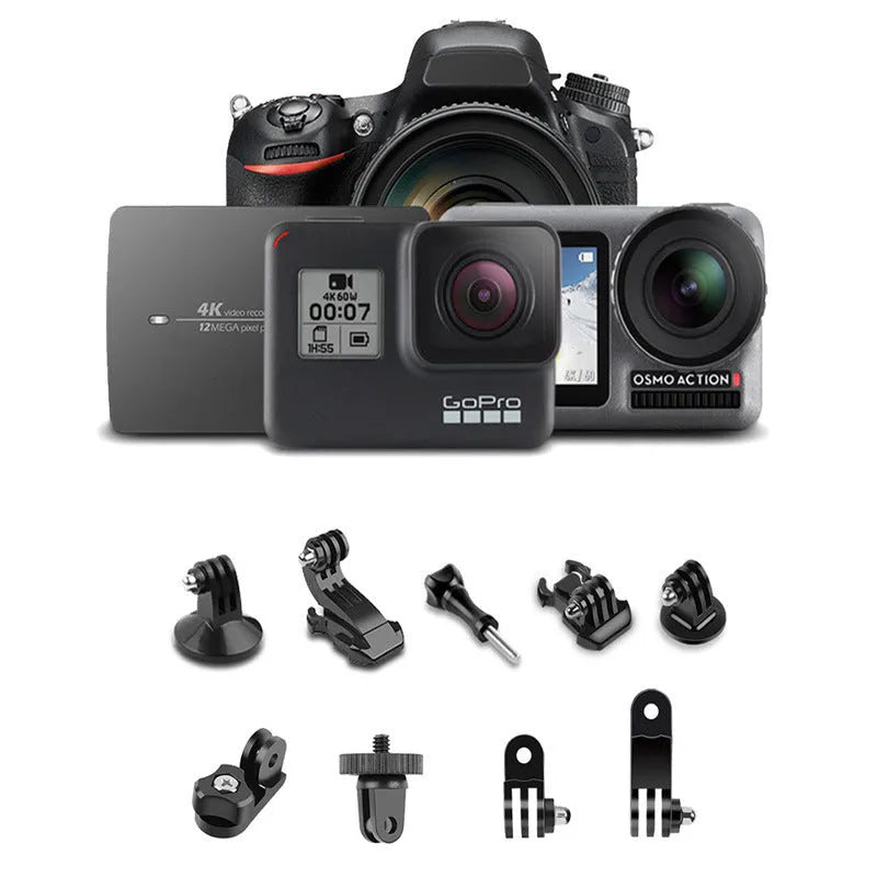 Extended black Bluetooth selfie stick with phone attached and separate wireless remote on a table