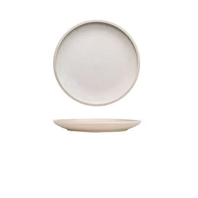 Blue matte ceramic dinner plate 10 inches with sesame point glaze on a table