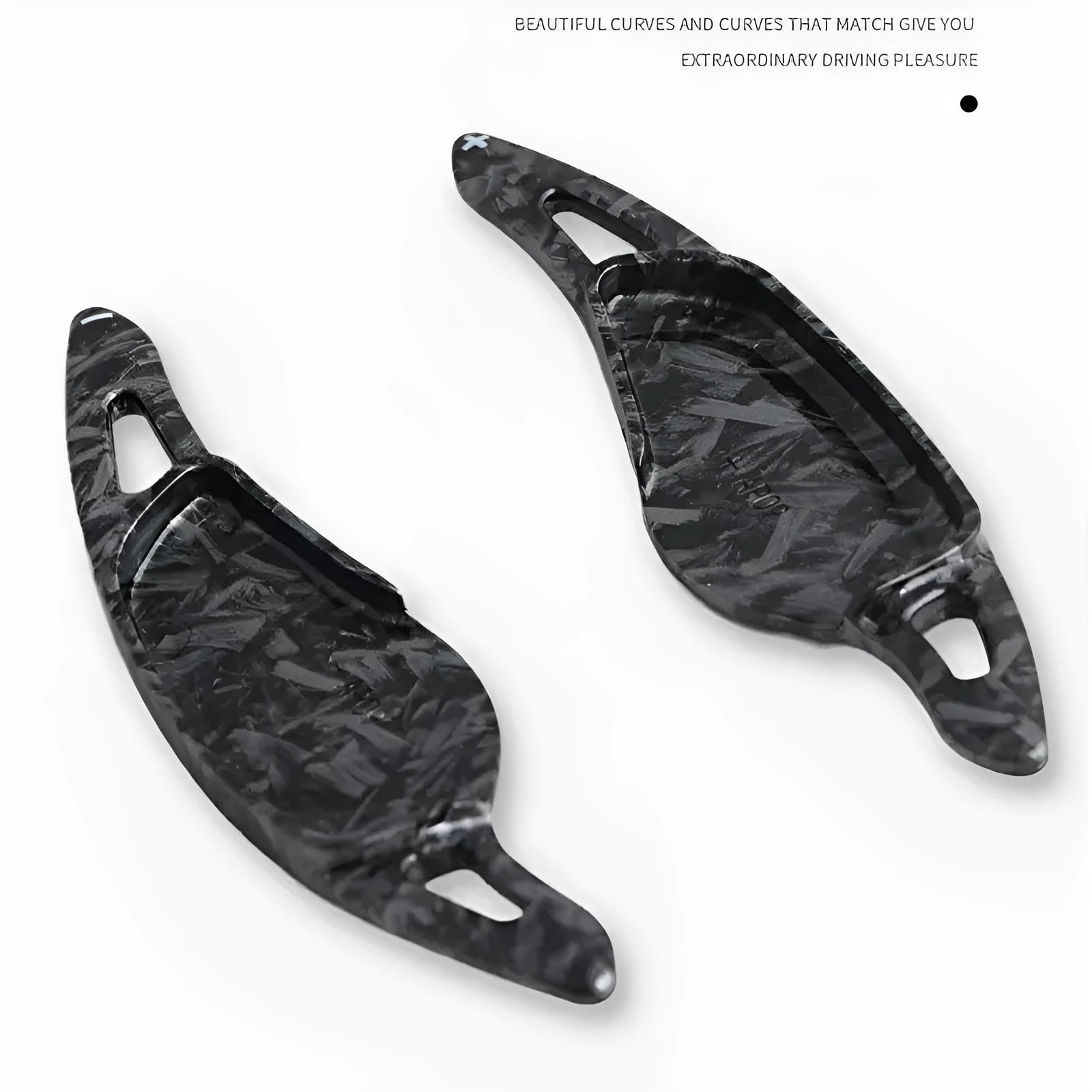Carbon fibre pattern steering wheel paddle shifters in black and red finishes