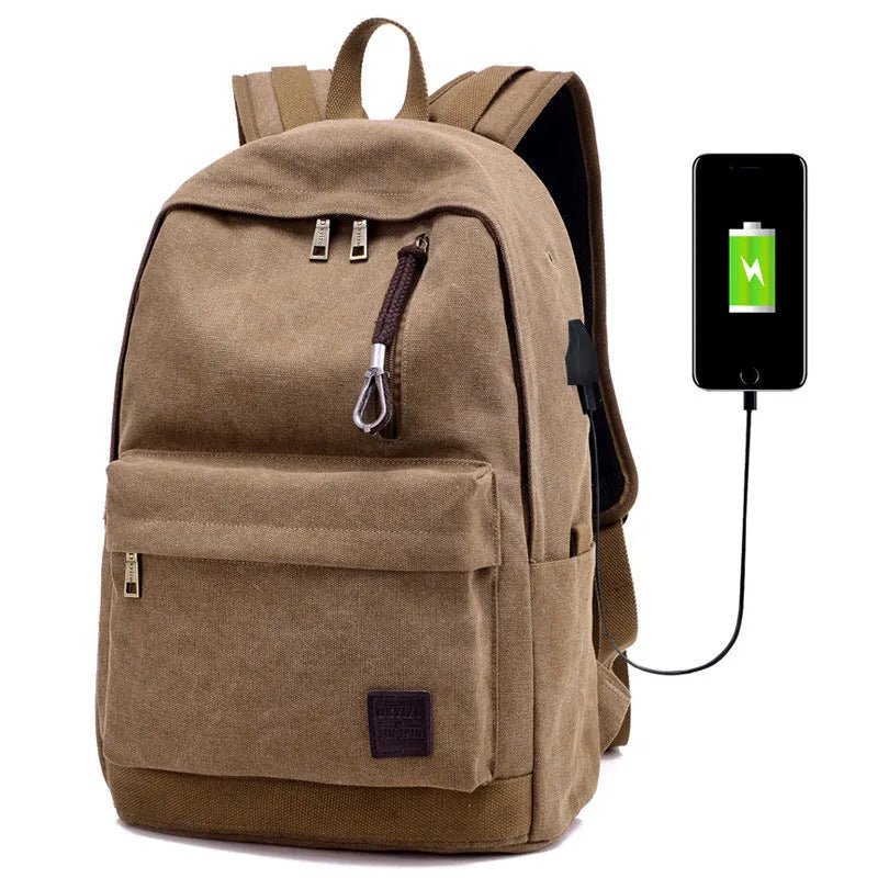Canvas backpack with USB charging port showing laptop compartment and multiple pockets