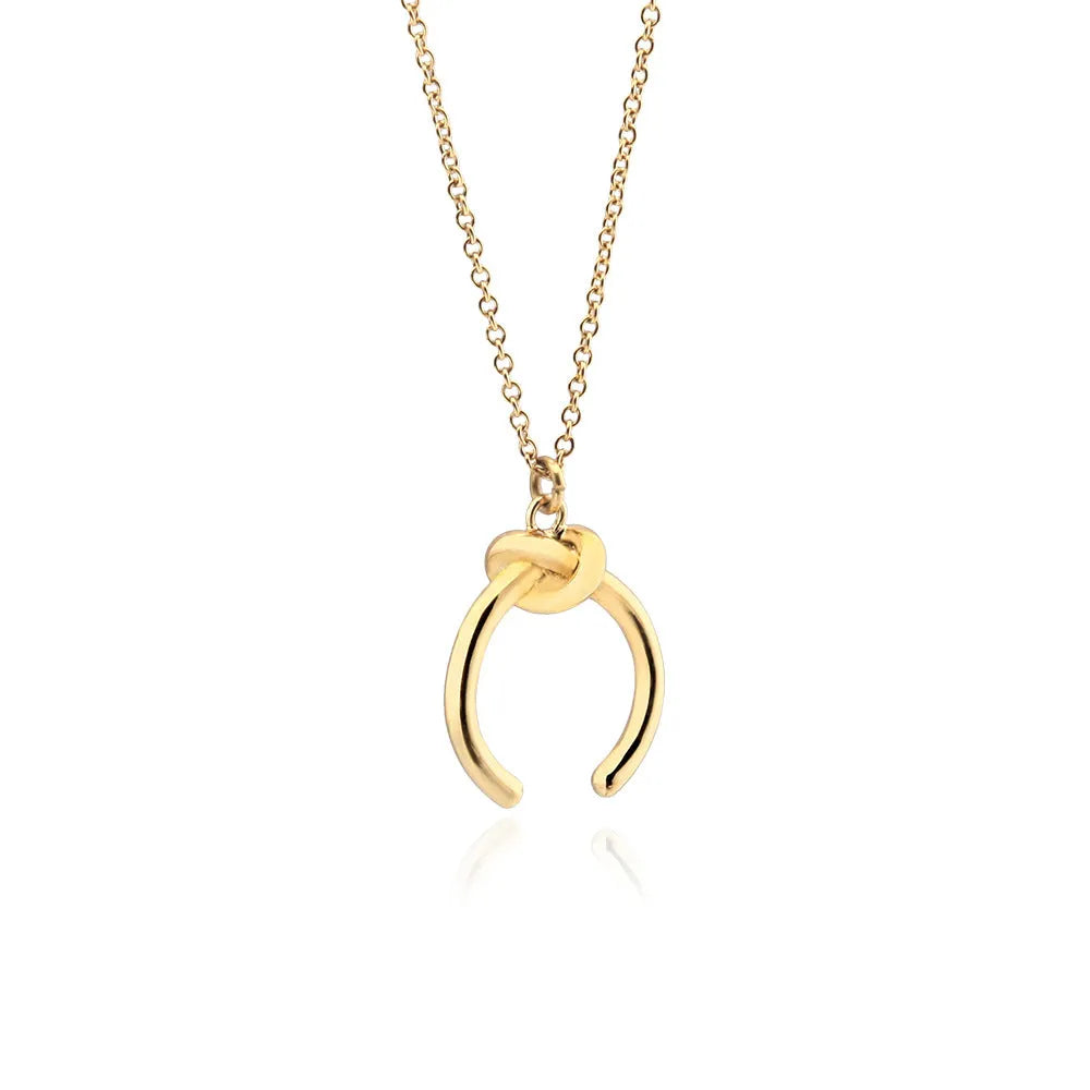 Geometric copper pendant necklace on an adjustable cross chain in gold or silver finish