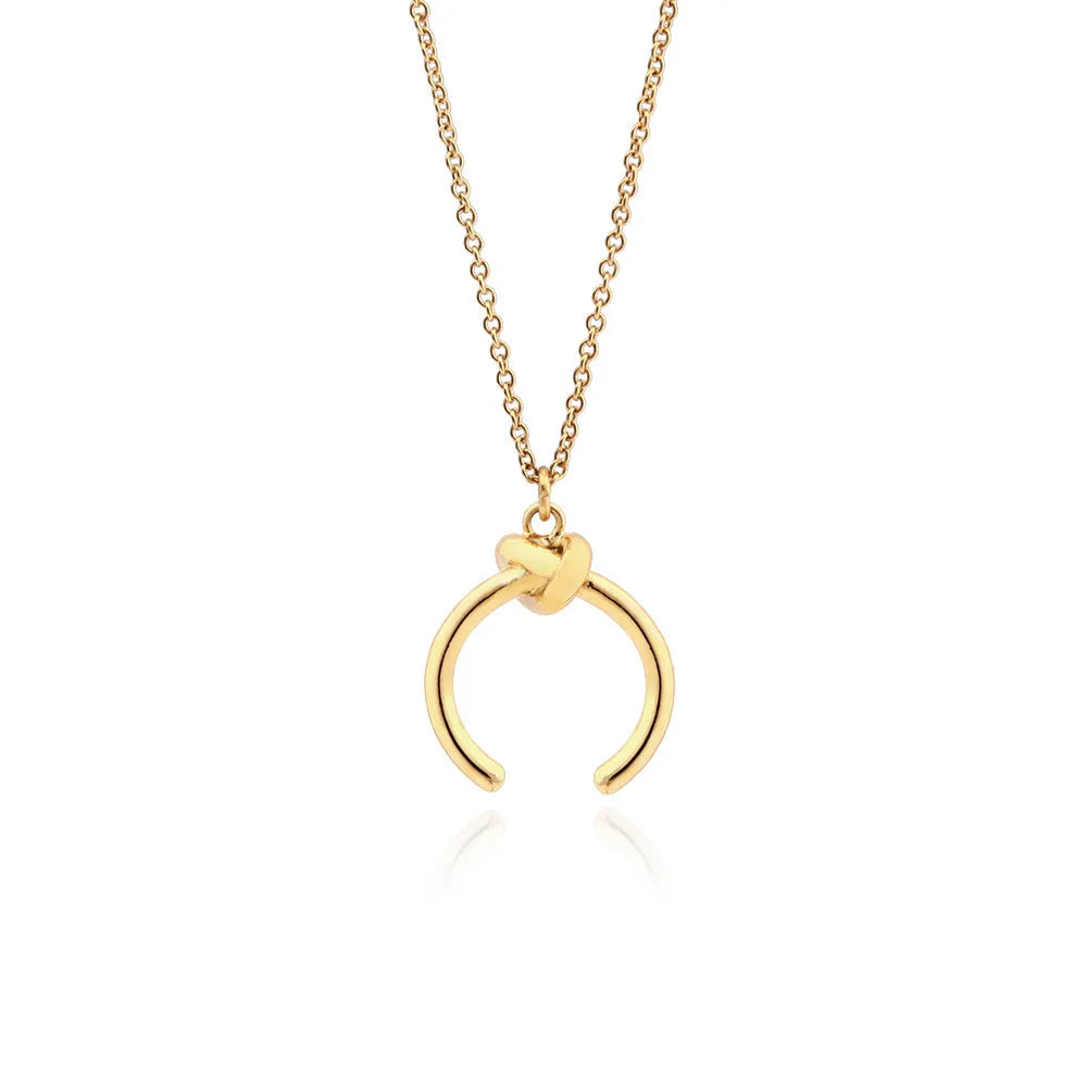 Geometric copper pendant necklace on an adjustable cross chain in gold or silver finish