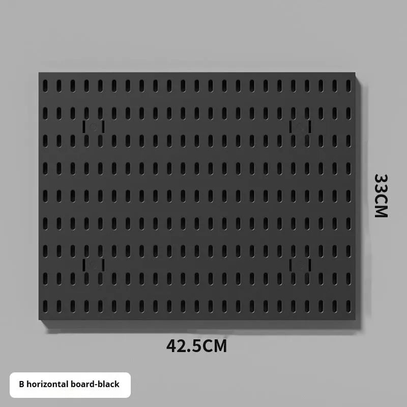White plastic punch-free wire-wrap board organising cables on wall with modular panel design