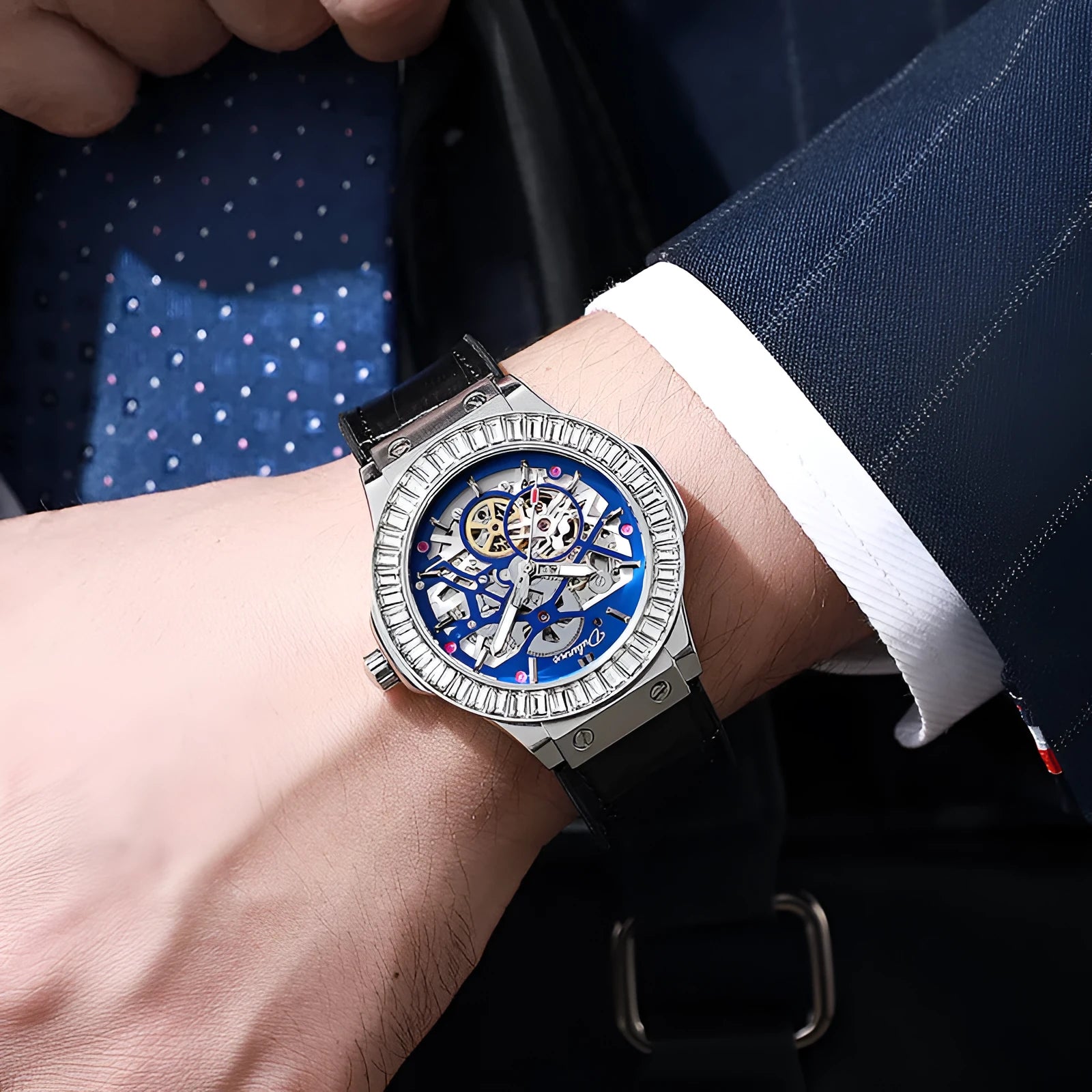 Automatic mechanical men's watch with hollow diamond-studded dial and 16mm white shell case.