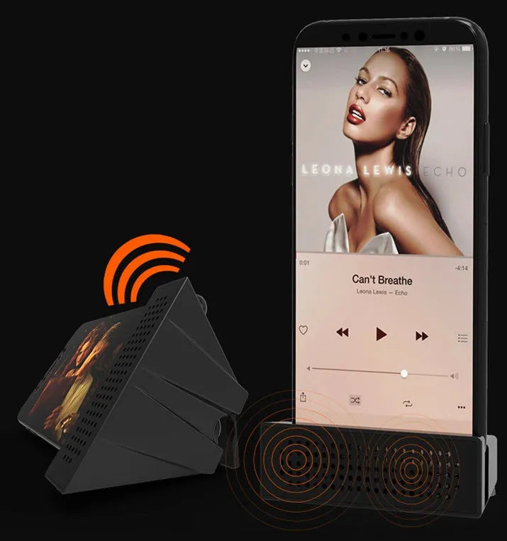 Portable black ABS mobile phone amplifier bracket holding an iPhone on a desk.