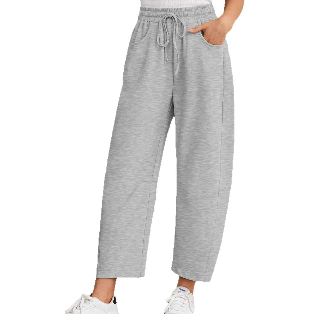 Loose cotton cropped sweatpants with elastic waistband in street fashion style