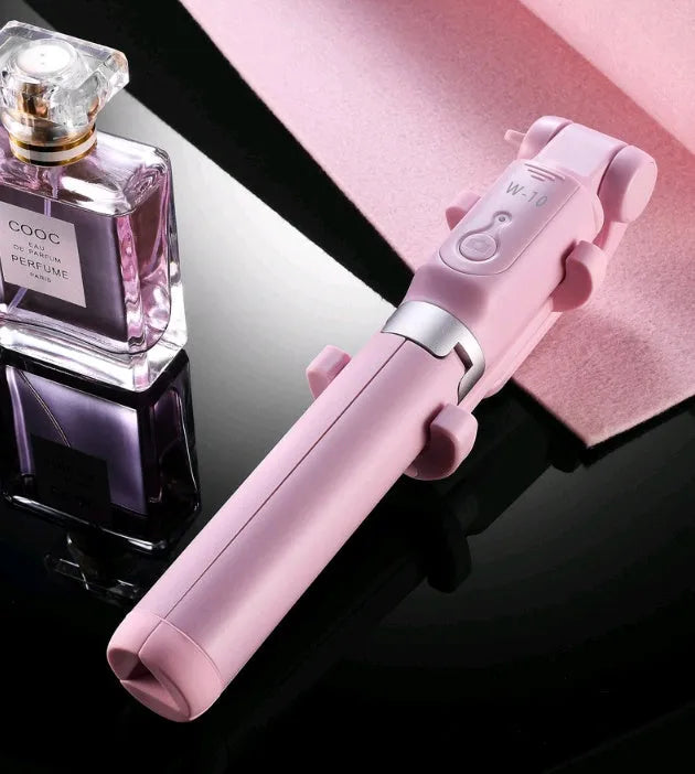 Aluminium alloy Bluetooth selfie stick with remote control and adjustable phone clip in black, pink, or white.