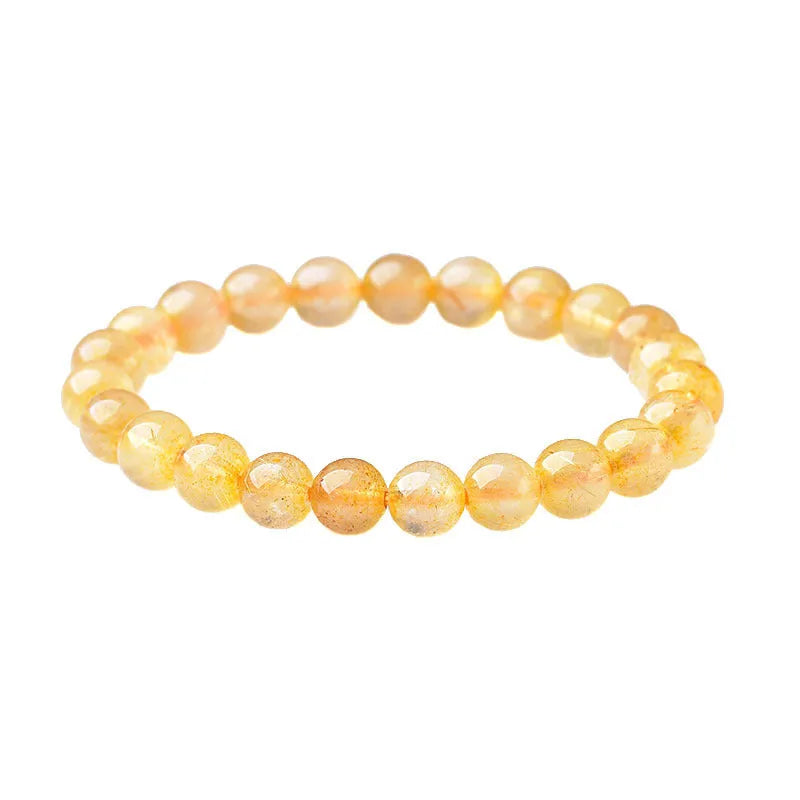 Natural crystal bracelet with 10mm clear beads on 19cm circumference elastic cord