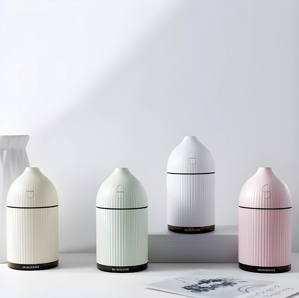 White USB aromatherapy diffuser humidifier with 300ml capacity and LED light on wooden table