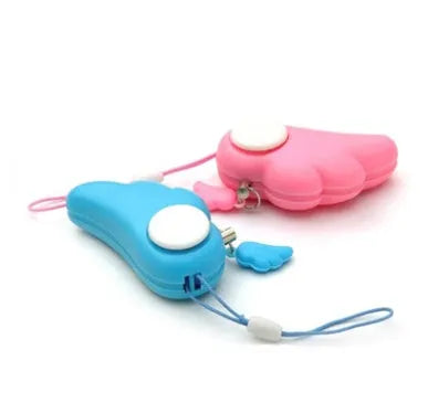 Blue personal security alarm with clip attached to a handbag strap, showing compact size and pull-rope mechanism