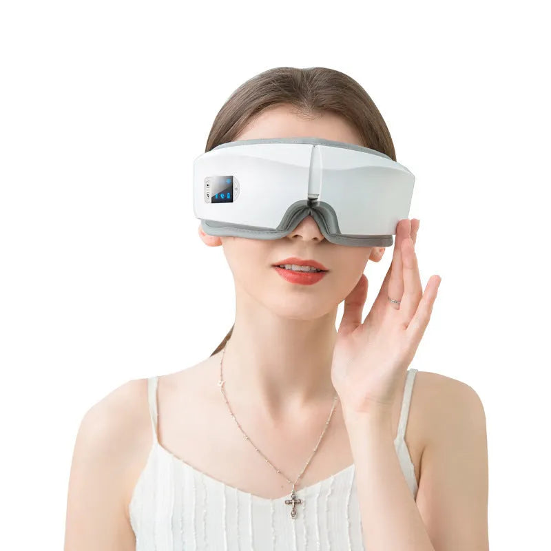 White eye massager with PU cover, LCD screen, and folding USB design for eye fatigue relief