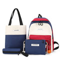 Four medium canvas backpacks in black, green, red, and white with zipper closure and air cushion straps