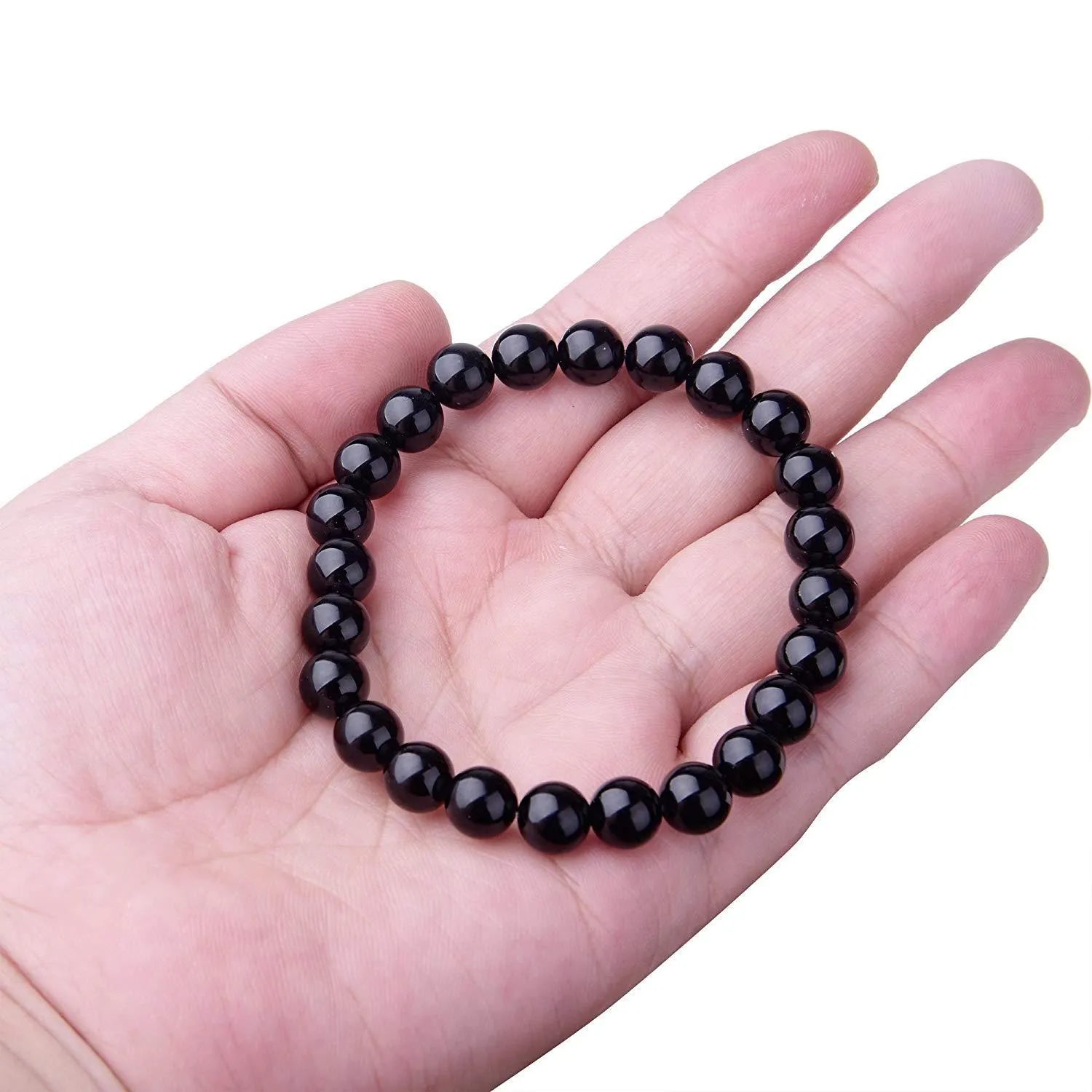 Black agate geometric bracelet with 8mm beads on a black elastic cord for women.