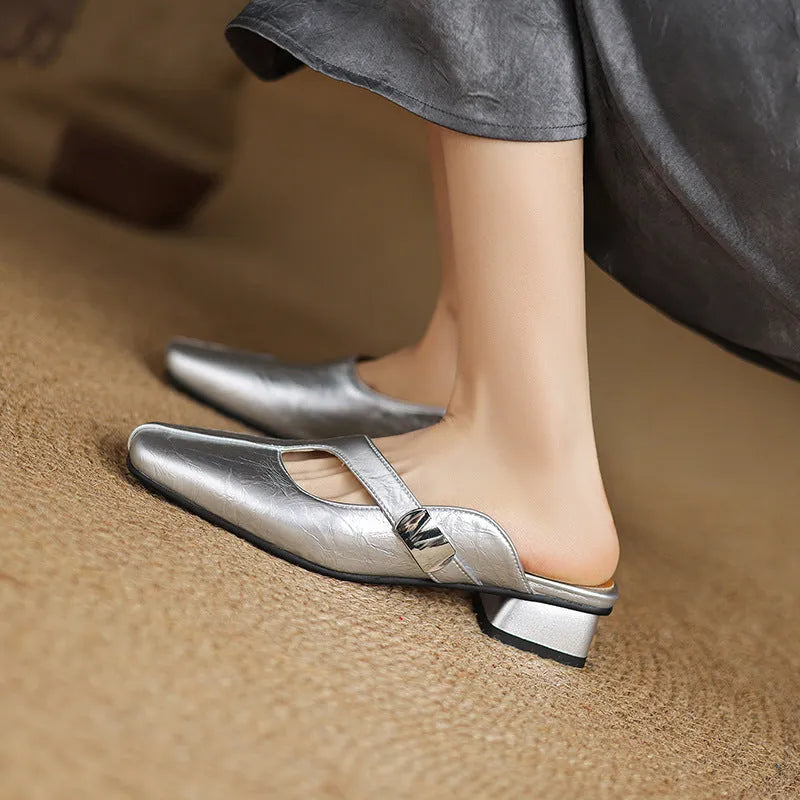 Pair of low heel outdoor slippers with a square toe in a solid colour