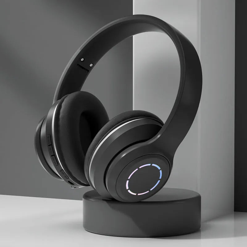 Gradient foldable wireless Bluetooth headset in blue with ear cushions and padded headband