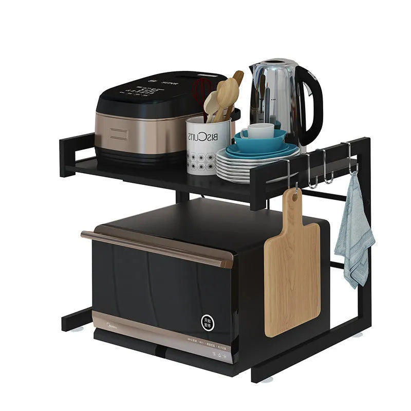 Retractable metal kitchen microwave rack with two layers on a countertop