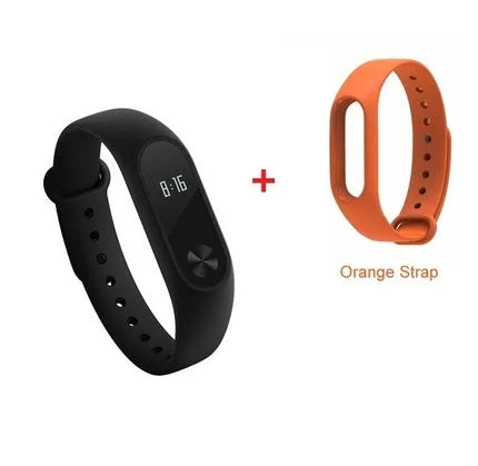 Black Xiaomi Mi Band 2 fitness tracker on wrist showing OLED display with heart rate reading