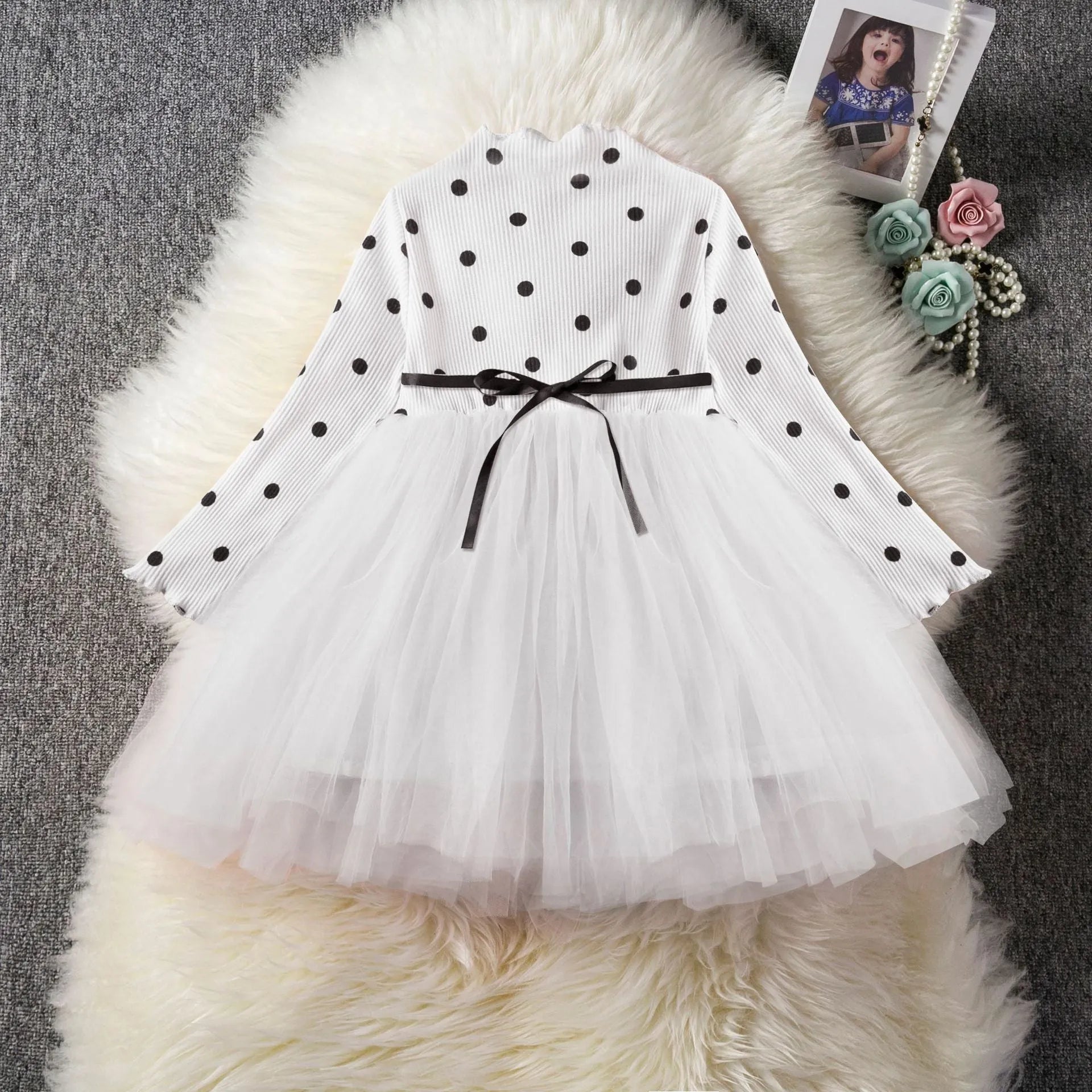 Baby girl's long sleeve black tutu lace dress for birthday parties and christenings.