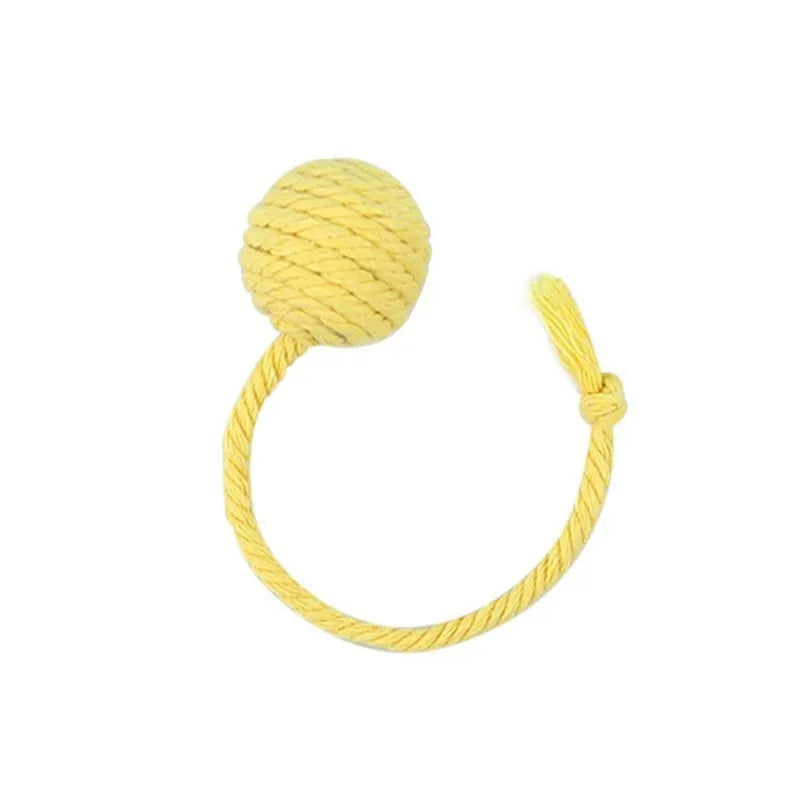 Cat toy ball with rope in four colours: green, pink, purple, and yellow