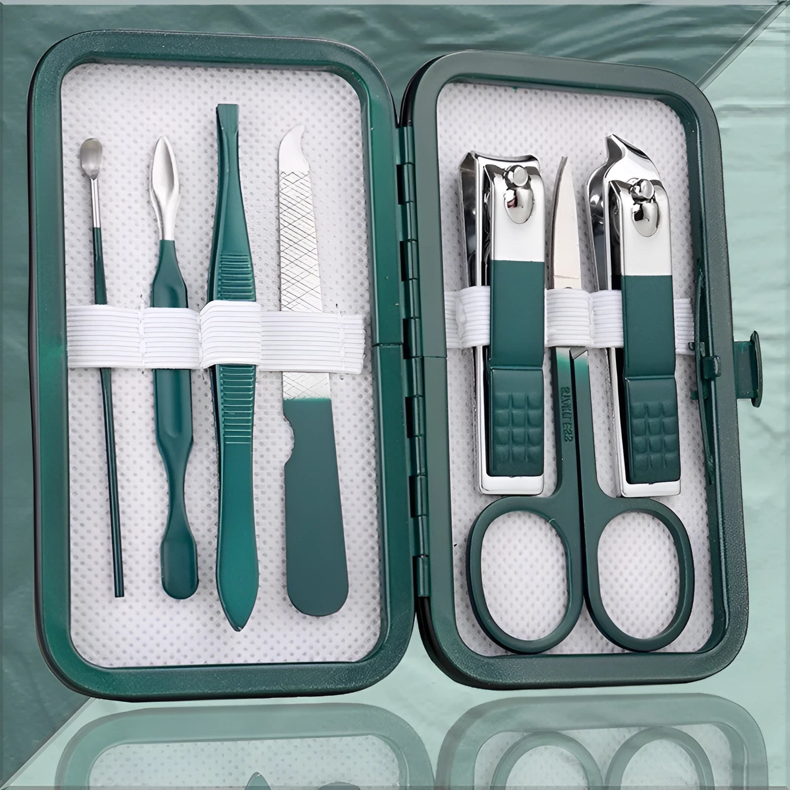 Emerald green manicure pedicure set in case with stainless steel and carbon steel nail clippers