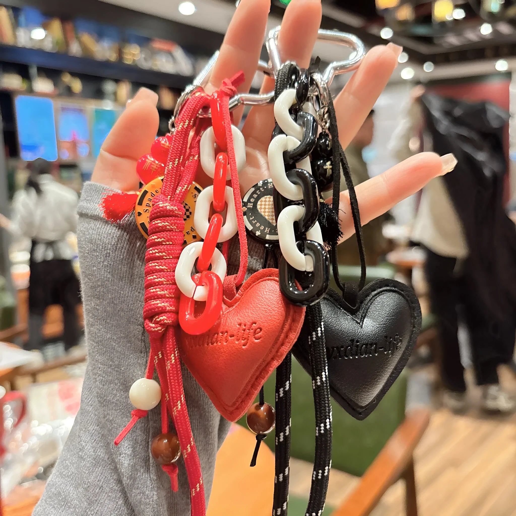 Woven rope leather heart-shaped small gourd pendant keychain in four colours brown black pink red for keys and bags