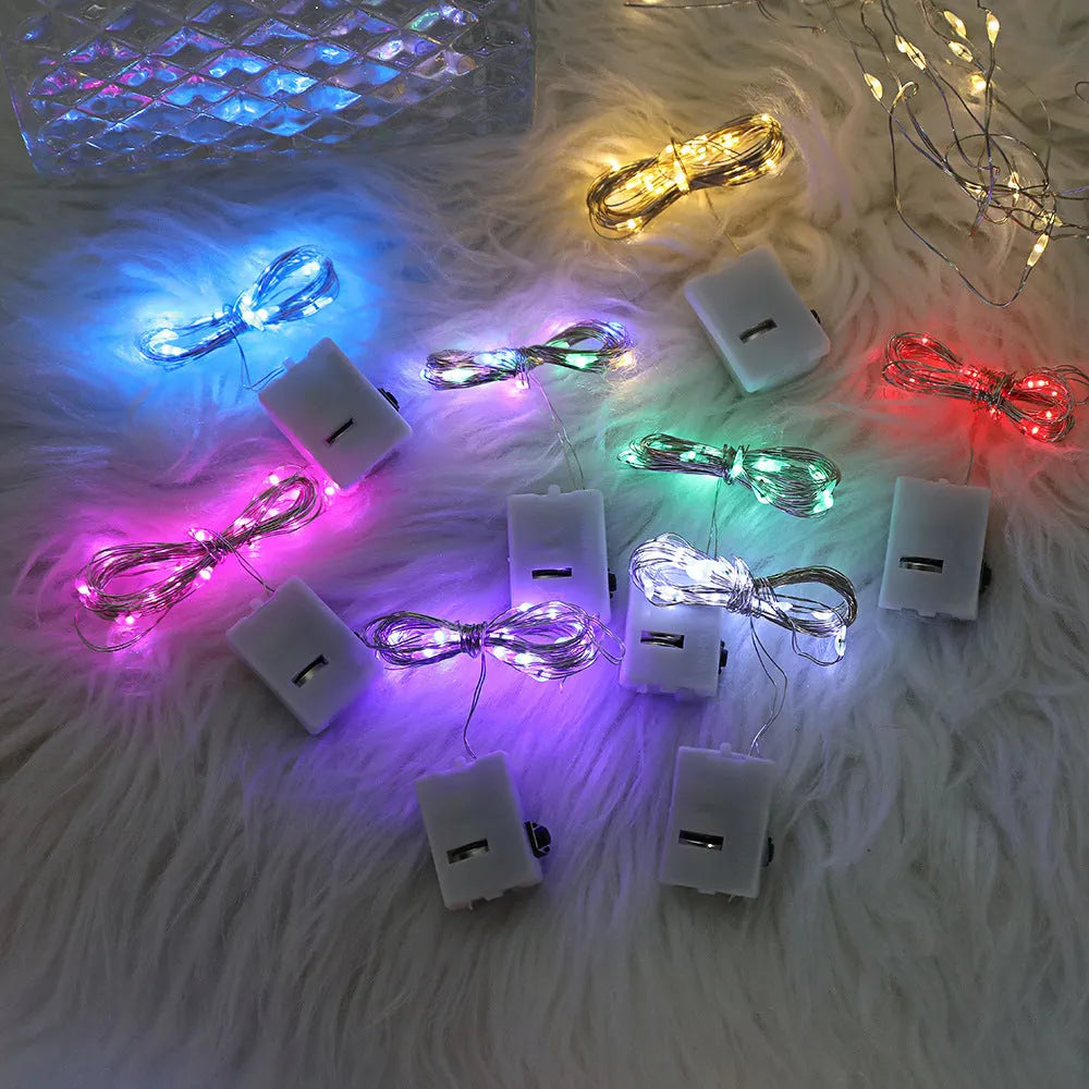 2m LED copper wire string light with three-gear colour options in small white box