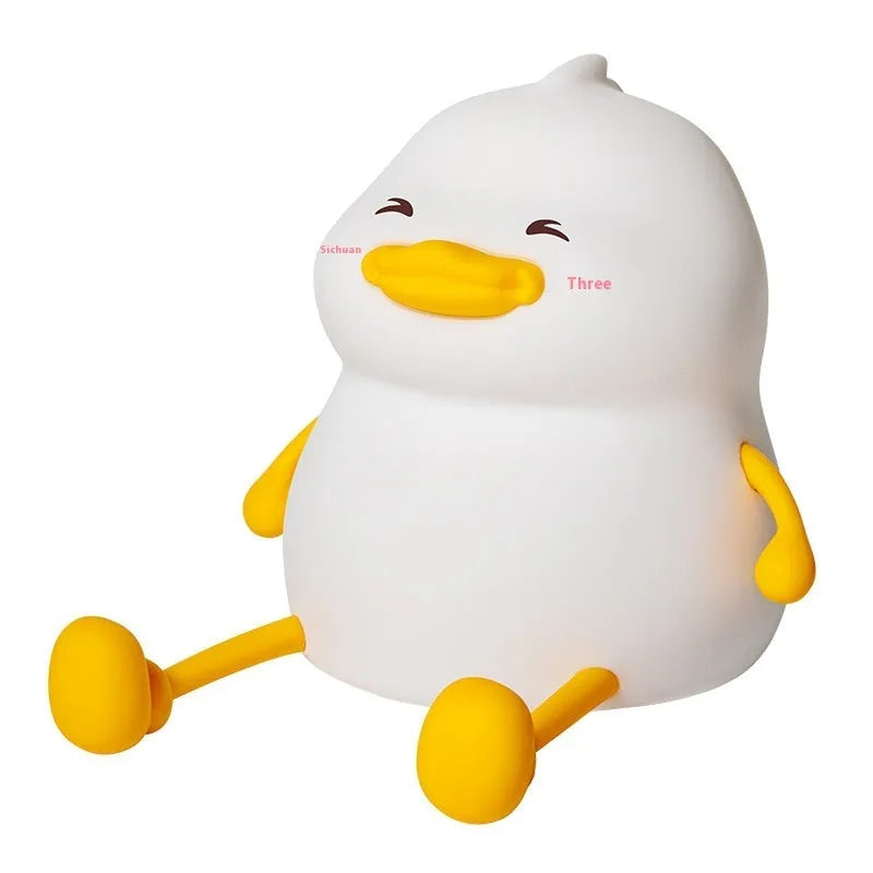 Chubby creative night lamp with phone holder function in silicone and plastic construction