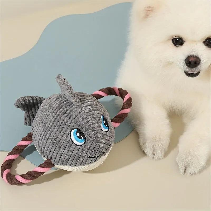 Turtle-shaped dog toy with knotted rope construction and plush stuffing for interactive chewing games