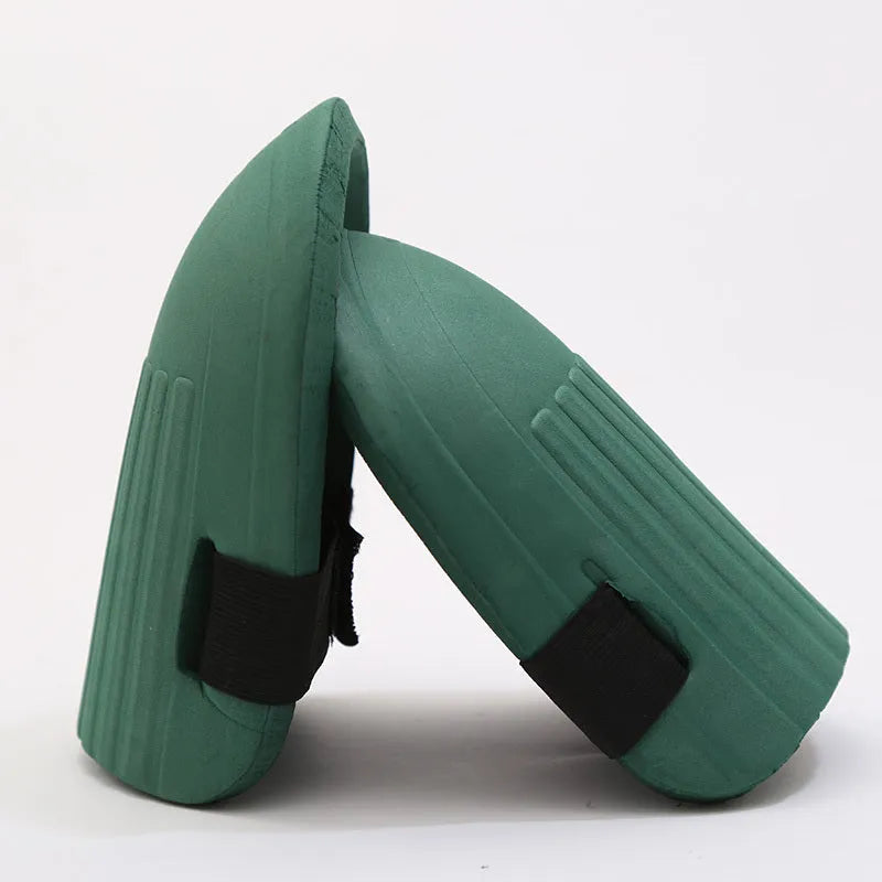 A pair of high-density EVA foam knee pads in army green, shown with dimensions for gardening and work protection.