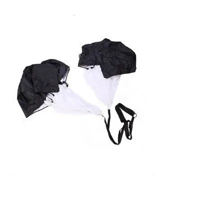 Black 56 inch running speed training parachute with adjustable waist belt on outdoor track
