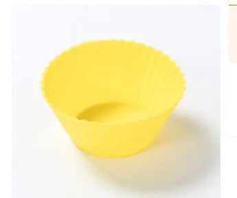 12 nonstick reusable silicone cupcake liners in six colours arranged for baking