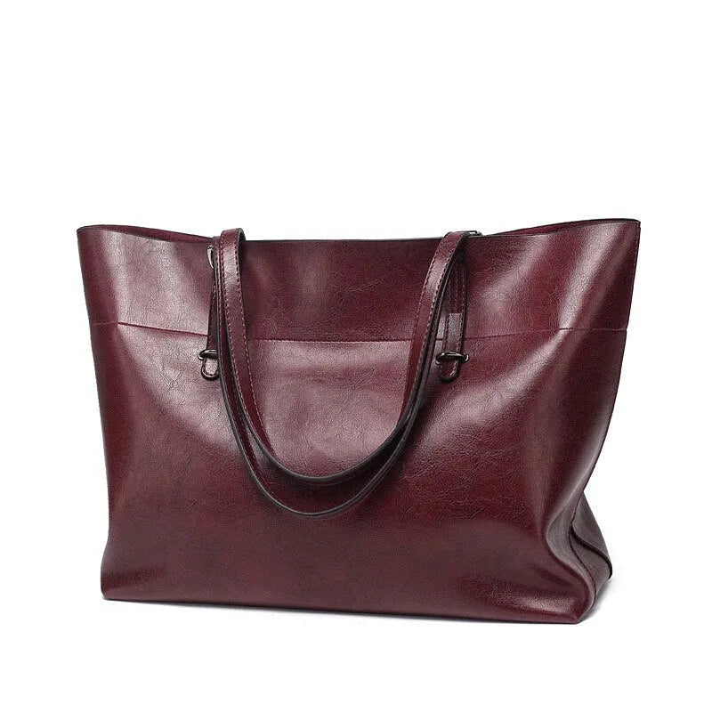 Horizontal waxed cowhide leather crossbody handbag for women showing internal compartments.