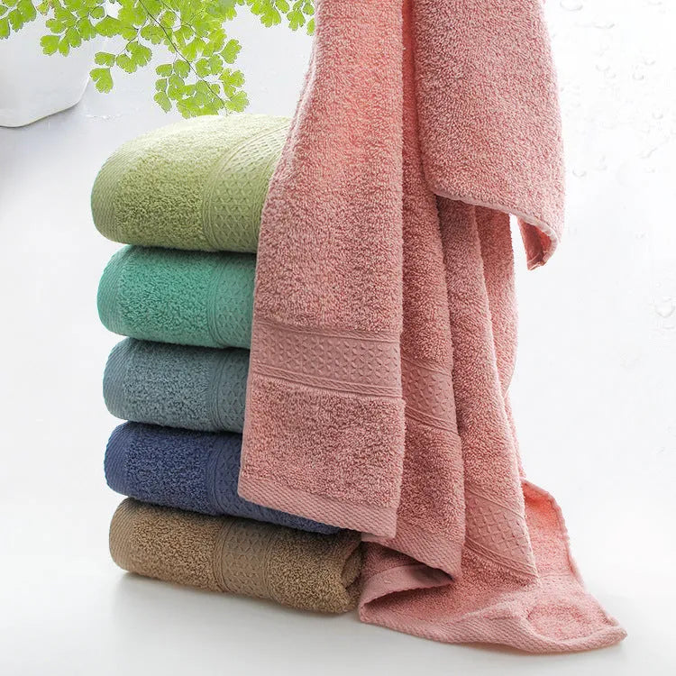 Thickened 800 gsm cotton bath and beach towel shown in apple green colour