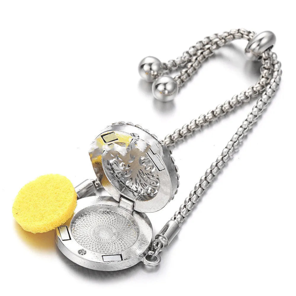 Hollow stainless steel adjustable aromatherapy bracelet with 20mm box diameter and electroplated alloy finish on white background